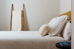Posteľ alebo postele v izbe v ubytovaní La Sillería de Triana by Magno Apartments