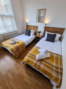 Postelja oz. postelje v sobi nastanitve Cooper's A favourite place to stay of many travellers to Burton-upon-Trent