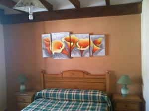 Cama o camas de una habitación en Casa Rural Valle Tosande