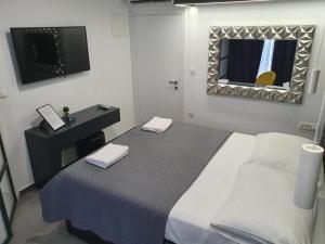 Lova arba lovos apgyvendinimo įstaigoje Mido Rooms