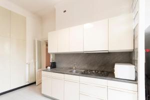 Kuchyňa alebo kuchynka v ubytovaní Washington Apartment