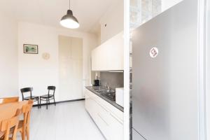 Kuchyňa alebo kuchynka v ubytovaní Washington Apartment