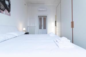 Posteľ alebo postele v izbe v ubytovaní Washington Apartment