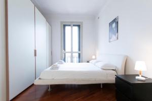 Posteľ alebo postele v izbe v ubytovaní Washington Apartment