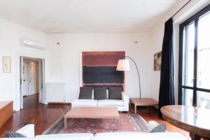 Posteľ alebo postele v izbe v ubytovaní Washington Apartment