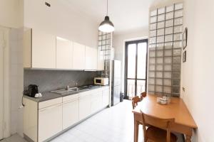 Kuchyňa alebo kuchynka v ubytovaní Washington Apartment
