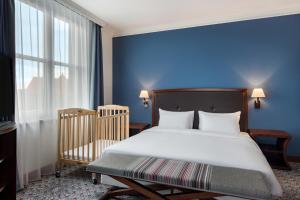 Łóżko lub łóżka w pokoju w obiekcie Radisson Blu Hotel Wroclaw