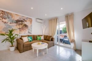 Ein Sitzbereich in der Unterkunft Ideal Property Mallorca - Son Moleto