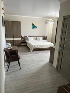 Katil atau katil-katil dalam bilik di Elite Hotel