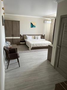 
Кровать или кровати в номере Elite Hotel
