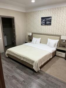 Katil atau katil-katil dalam bilik di Elite Hotel