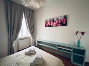 Llit o llits en una habitació de Appartamento Bandiera Blu