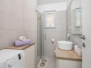 Ein Badezimmer in der Unterkunft Apartment Dolce