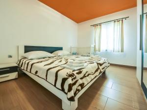Posteľ alebo postele v izbe v ubytovaní Apartment Anić-3 by Interhome