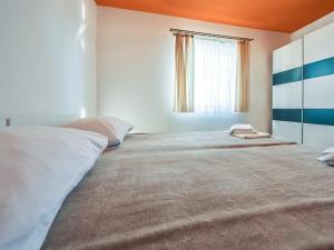 Posteľ alebo postele v izbe v ubytovaní Apartment Anić-3 by Interhome