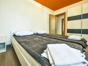 Posteľ alebo postele v izbe v ubytovaní Apartment Anić-3 by Interhome