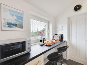 A kitchen or kitchenette at Holiday Home Clearwater by Interhome