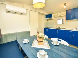 Kuchyňa alebo kuchynka v ubytovaní Holiday Home Palma-1 by Interhome