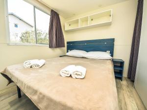 Postel nebo postele na pokoji v ubytování Holiday Home Palma-4 by Interhome