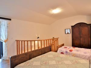 Postel nebo postele na pokoji v ubytování Holiday Home Latin by Interhome