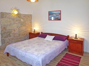 Postel nebo postele na pokoji v ubytování Holiday Home Kapitan by Interhome