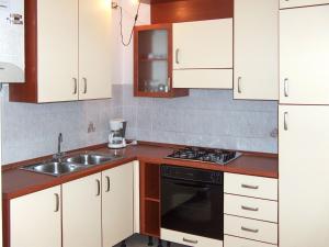 Cuina o zona de cuina de Holiday Home Turelli-1 by Interhome