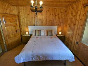 A bed or beds in a room at Apartment Trepalle by Interhome