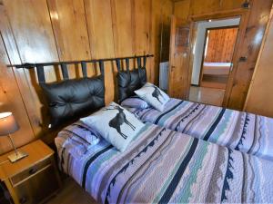 A bed or beds in a room at Apartment Trepalle by Interhome