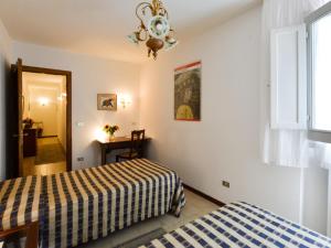 Posteľ alebo postele v izbe v ubytovaní Holiday Home Villa Lucia by Interhome