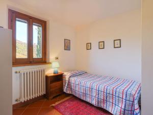 A bed or beds in a room at Holiday Home Villa Magna by Interhome
