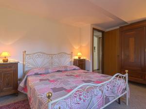 A bed or beds in a room at Holiday Home Villa Magna by Interhome