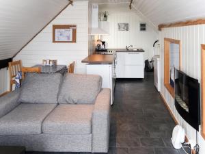 Posezení v ubytování Holiday Home Låven - FJS161 by Interhome