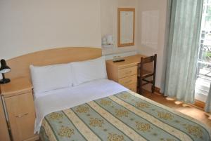 Postel nebo postele na pokoji v ubytování European Hotel + 23 fotografií