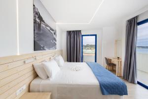Postel nebo postele na pokoji v ubytování Raffaello Beach