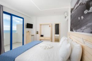 Postel nebo postele na pokoji v ubytování Raffaello Beach