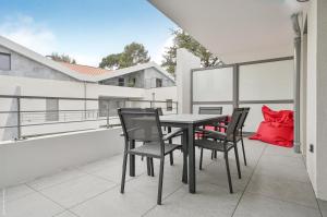 Balkón nebo terasa v ubytování T2 NEUF - TERRASSE ET PISCINE – ACCÈS DIRECT PLAGES ET CENTRE VILLAGE – App 29B -