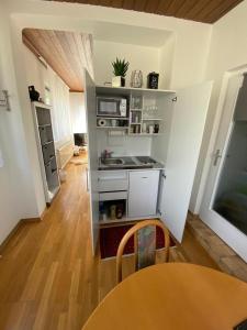 Kuchyň nebo kuchyňský kout v ubytování Appartements Gabat Nähe Red Bull Ring