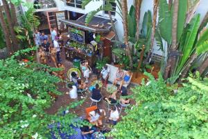 an overhead view of a group of people in a garden at Freehand Miami in Miami Beach
