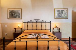 Postel nebo postele na pokoji v ubytování Agriturismo Case Don Ignazio