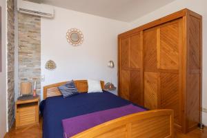 Ein Bett oder Betten in einem Zimmer der Unterkunft Golden View Apartment