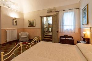 Postel nebo postele na pokoji v ubytování Agriturismo Case Don Ignazio
