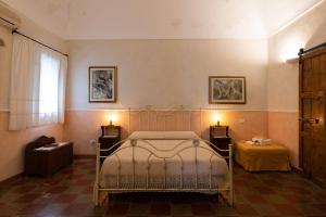 Postel nebo postele na pokoji v ubytování Agriturismo Case Don Ignazio
