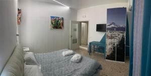 Televízia a/alebo spoločenská miestnosť v ubytovaní Catania Apartment Borgo Suite Autonomous