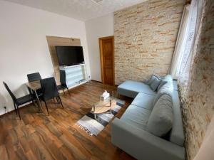 TV a/nebo společenská místnost v ubytování Apartment Hlinská
