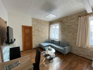 TV a/nebo společenská místnost v ubytování Apartment Hlinská