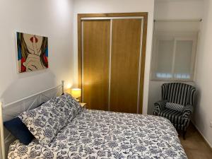 A bed or beds in a room at Palma 2 sueños