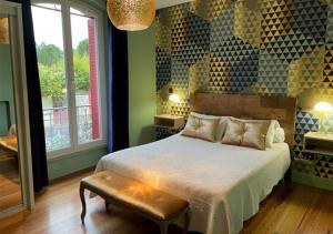 Giường trong phòng chung tại Villa La Muse +62 ảnh