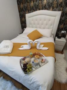 a tray of food on top of a bed at Casa Maral in Pontevedra