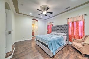 a bedroom with a bed and a ceiling fan at Manteca Home with Gated Yard about 2 Mi to Downtown in Manteca