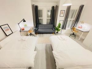 Postel nebo postele na pokoji v ubytování Leytonstone House - SleepyLodge